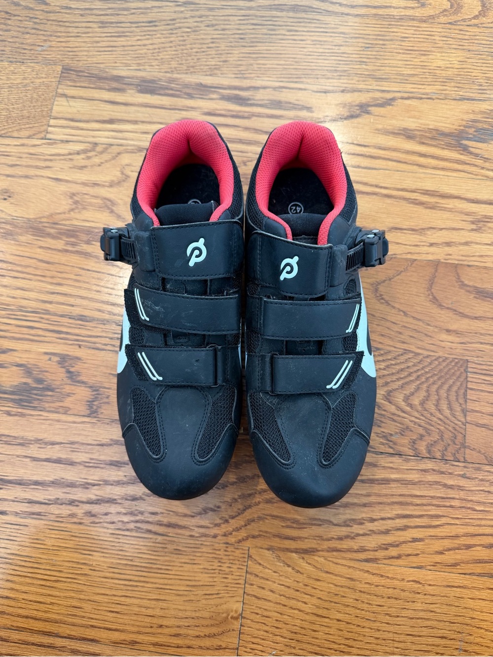 Peloton Black Athletic Shoes with Red Lining and White Accents
